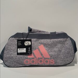 NWT Adidas Crossbody Ladies Gym Bag with lots of room inside.